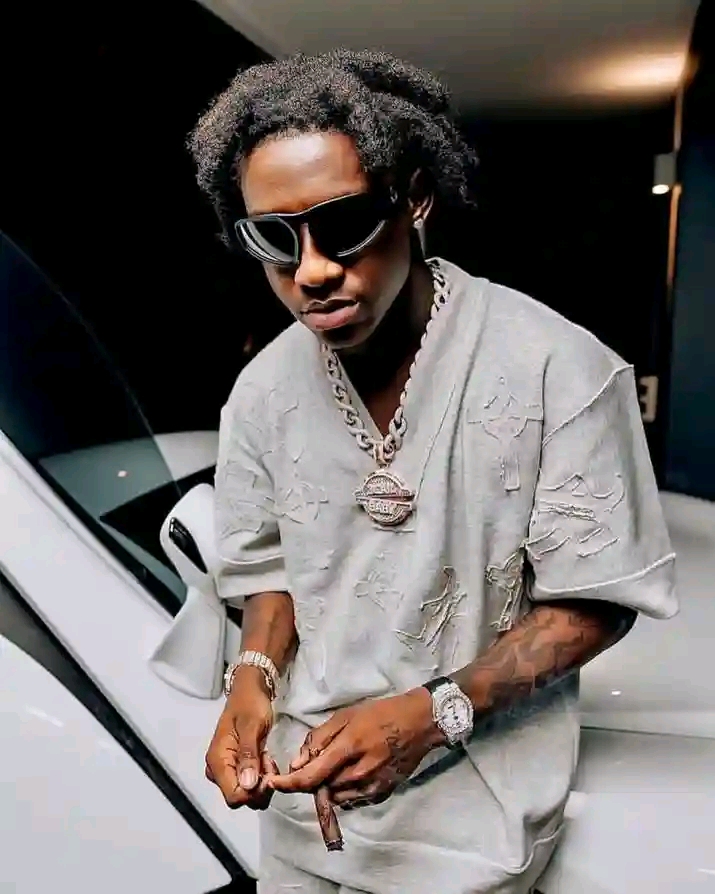 Shallipopi Turns Heads in Lagos with 340M Matte Black Lamborghini Huracán EVO